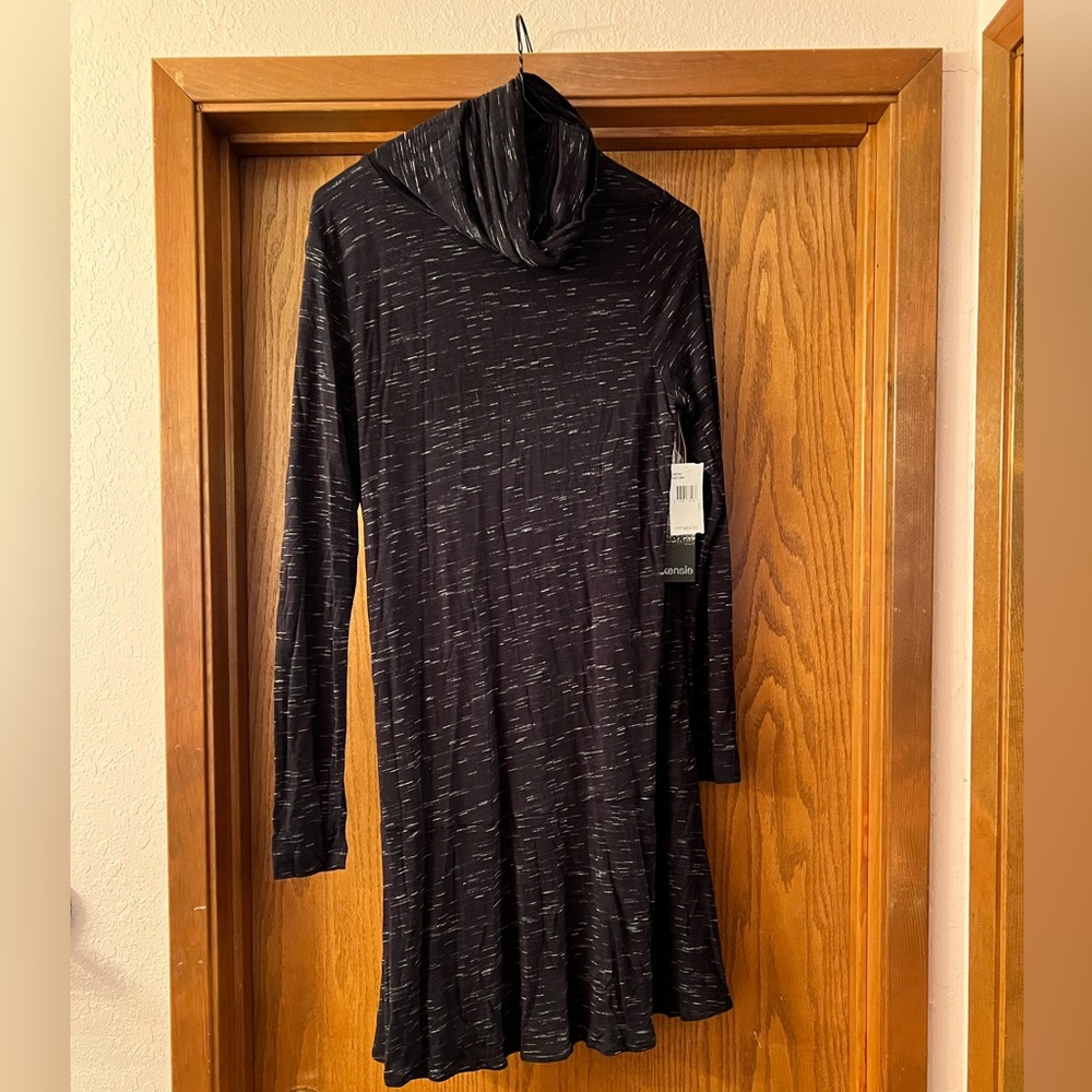 Long sleeve black dress.